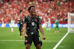 Jonathan David celebeating goal for Canada aainst Qatar