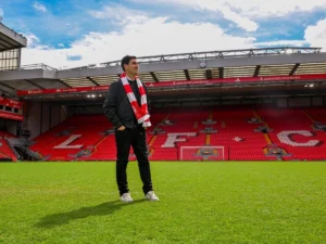 Andoni Iraola standing on the pitch at Anfield