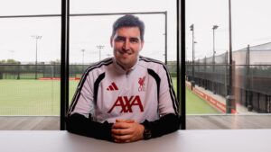 Andoni Iraola posing in Liverpool shirt after club announce appointment