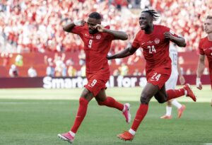 Cyle Larin celebrating goal for Canada against Bosnia in the 2026 World Cup