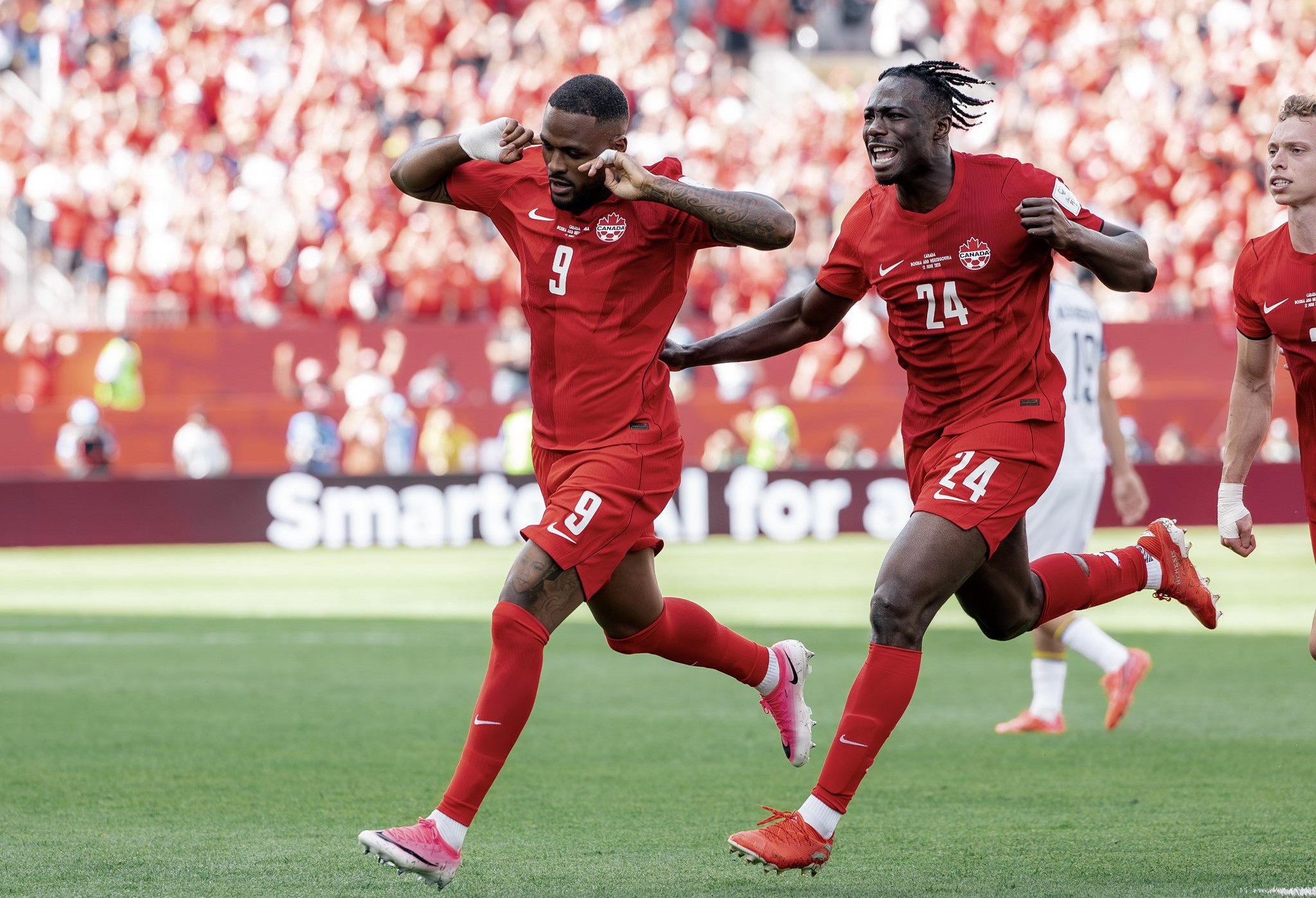 Cyle Larin celebrating goal for Canada against Bosnia in the 2026 World Cup
