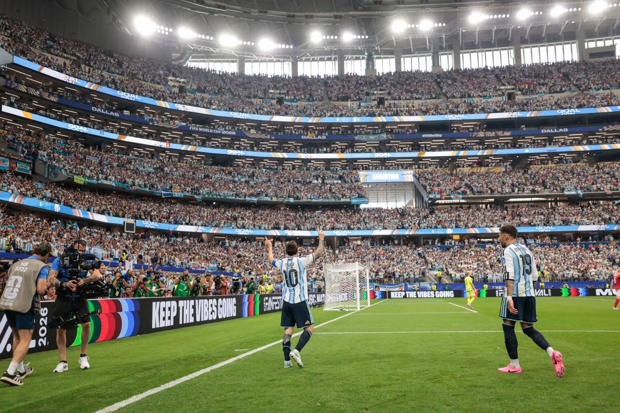 Lionel Messi celebrating in stadium after scoring for Argentina