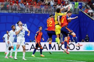 Cape Verde goalkeeper Vozinha claiming a cross in World Cup match against Spain