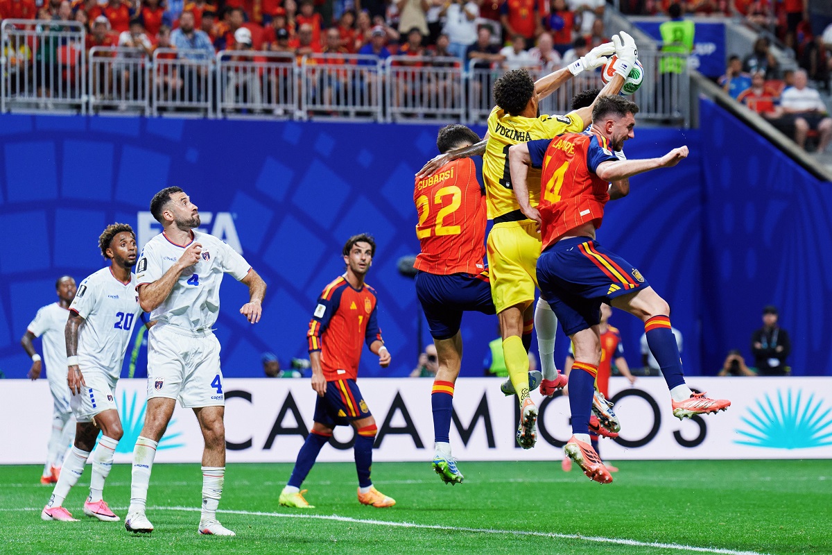 Cape Verde goalkeeper Vozinha claiming a cross in World Cup match against Spain
