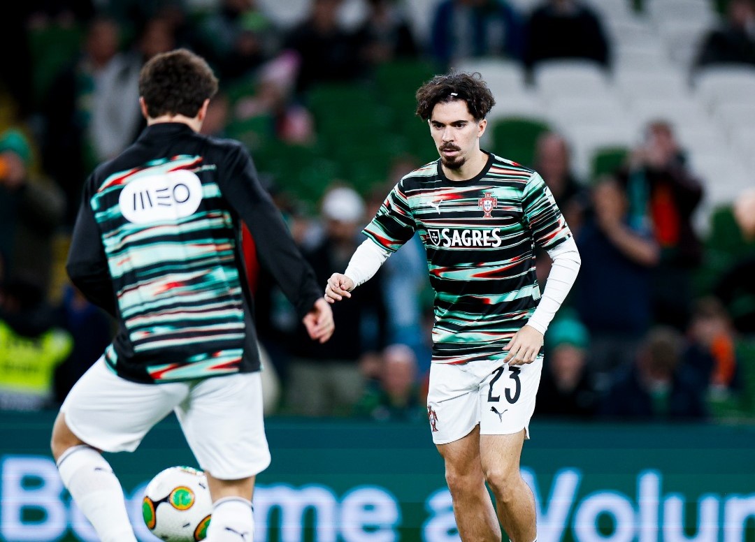Vitinha and Joao Neves passing the ball in a Portugal warm up