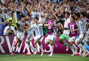 Julian Alvarez celebrating with teammates after scoring for Argentina against Switzerland