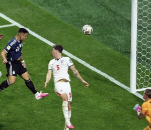 Argentina forward Lautaro Martinez scoring the winning goal against England with a header