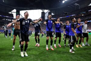 Argentina players celebrating semi-final win over England