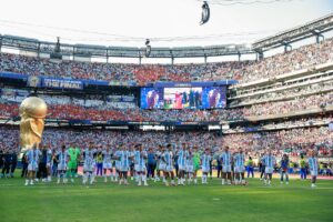 Argentina players standing on the pitch after the World Cup final