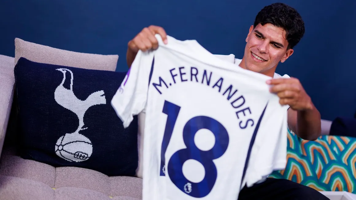 Mateus Fernandes posing with Tottenham jersey