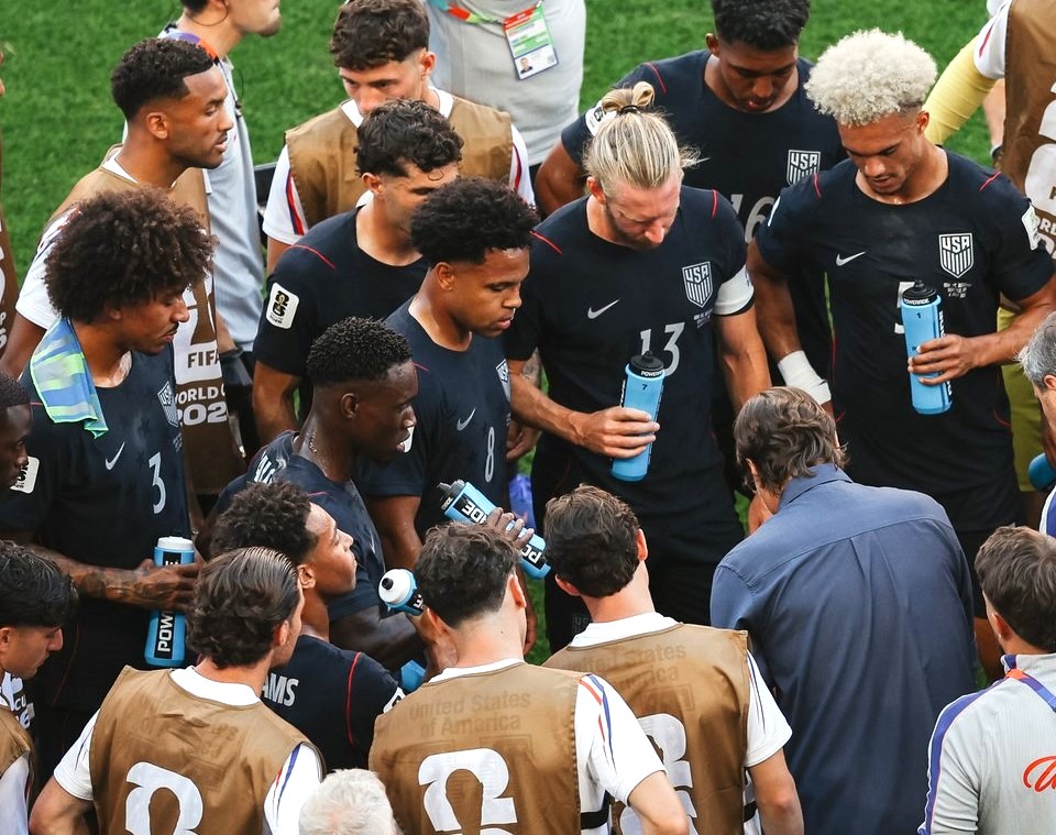 Mauricio Pochettino instructing USA players during match against Belgium