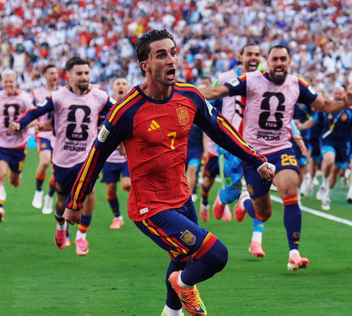 Spain's Ferran Torres celebrating with teammates after scoring the winner in the World Cup final