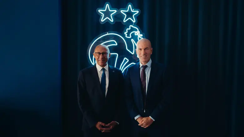 New France coach Zinedine Zidane posing with French football federation president, Philippe Diallo