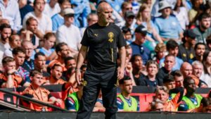 Manchester City boss Enzo Maresca directing his team from the sidelines