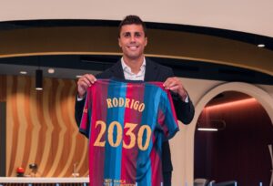 Rodri posing with a Barcelona shirt