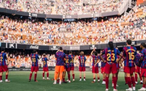 Barcelona players acknowledging fans at the Mestalla