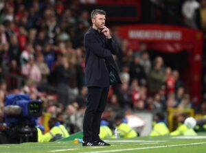 Michael Carrick standing on the sidelines