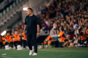 Barcelona manager Hansi Flick watching his team from the sidelines