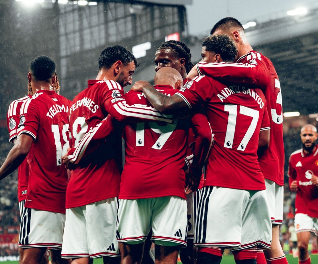 Manchester United players celebrating a goal