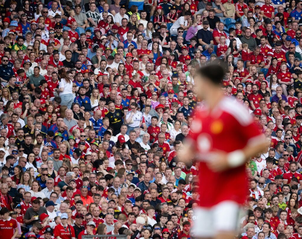 Manchester United fans watching on from the stands