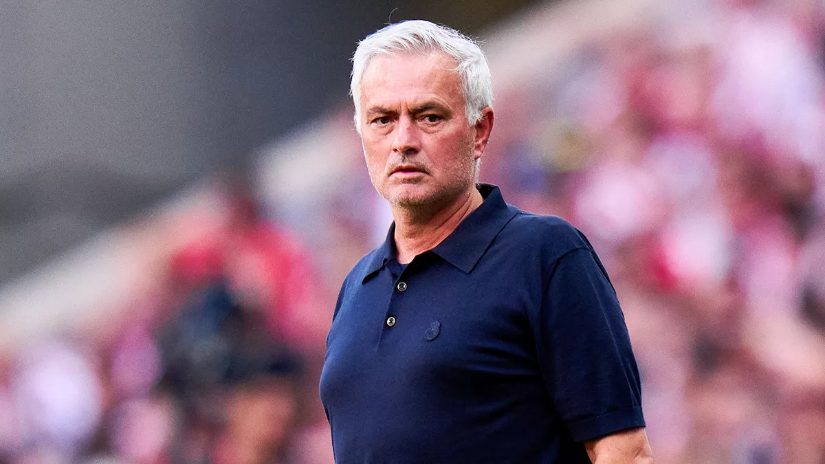 Real Madrid coach Jose Mourinho standing on the sidelines