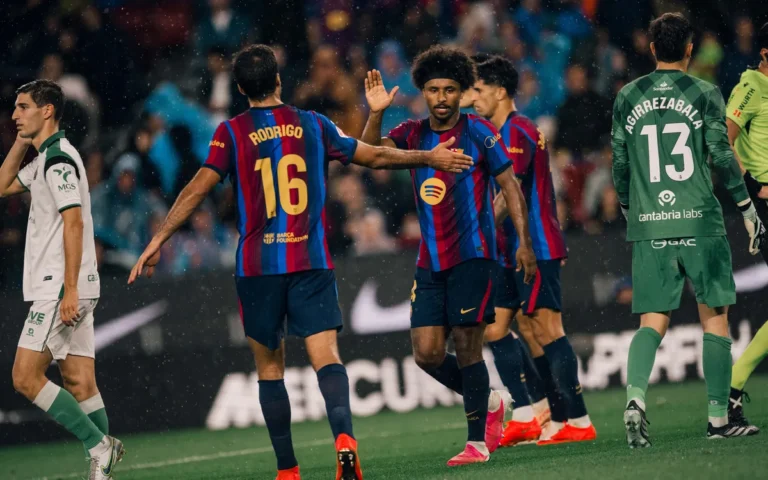 Rodri celebrating with Barcelona teammate