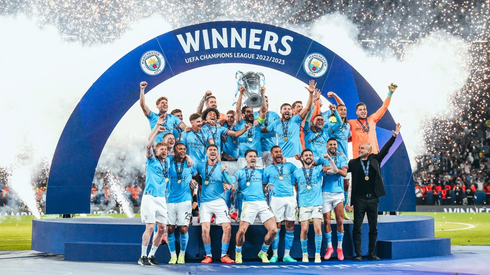 Manchester City lifting Champions League trophy