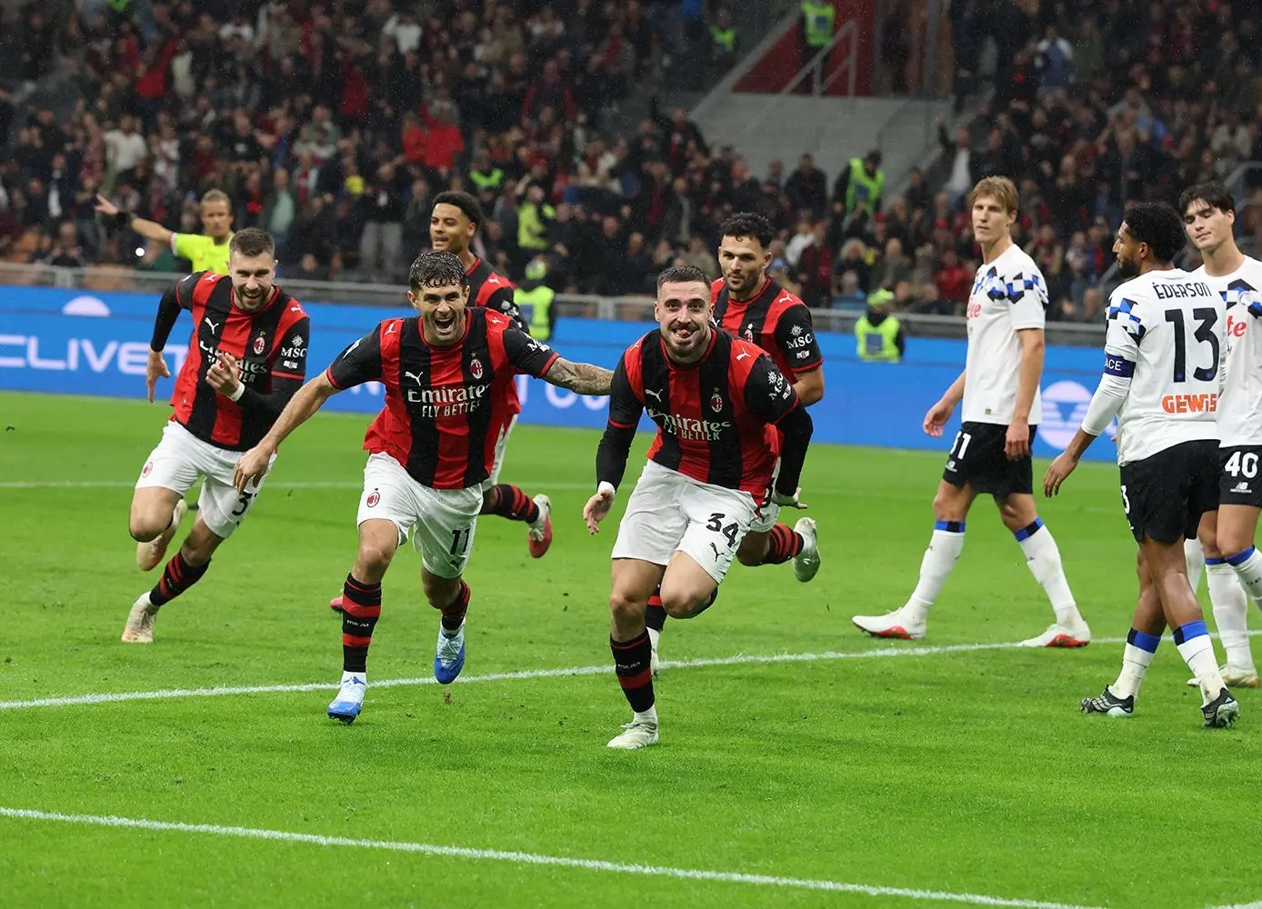 AC Milan players celebrating goal