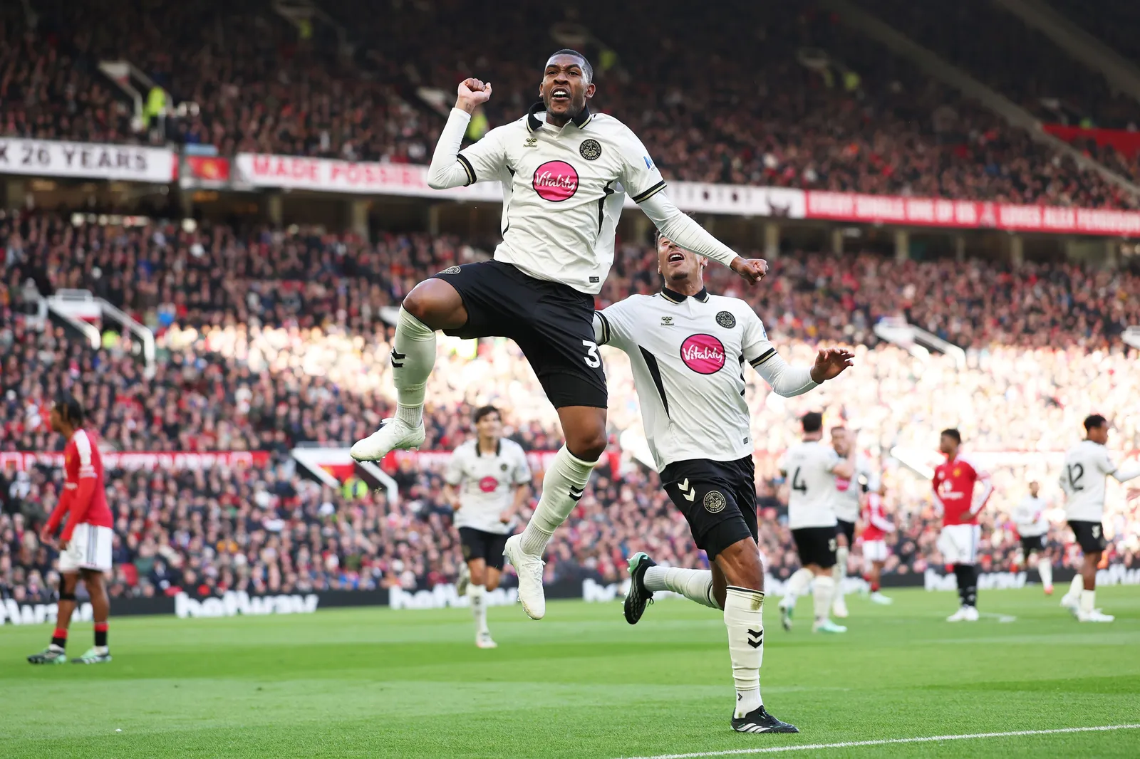 Bournemouth players celebrating goal against Manchester United