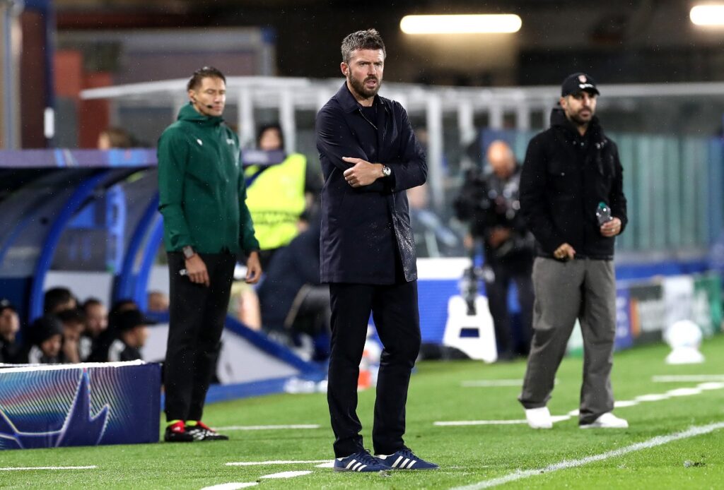 Manchester United coach Michael Carrick standing on the sidelines
