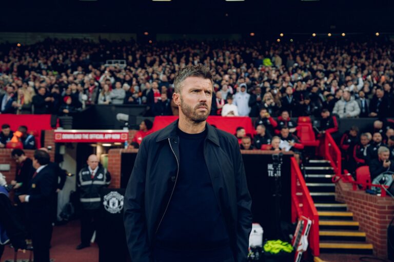 Manchester United coach Michael Carrick standing at Old Trafford