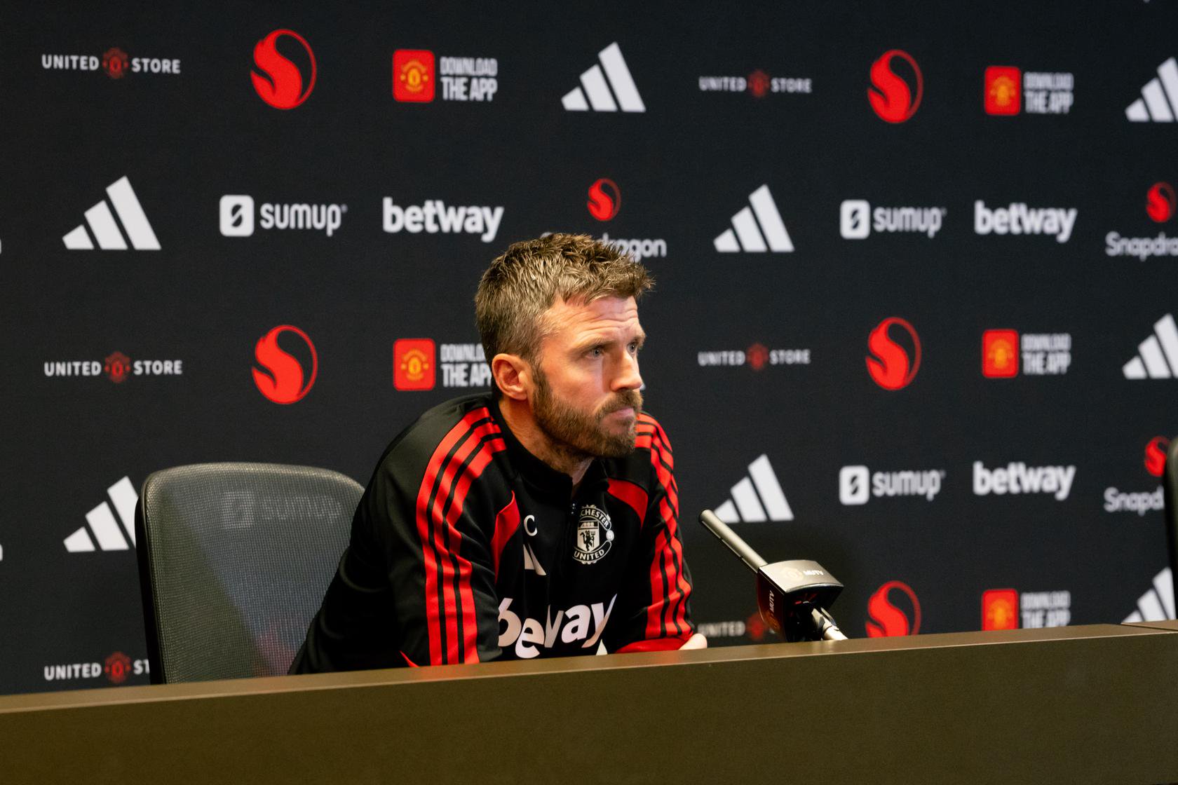 Michael Carrick speaking in a Manchester United press conference