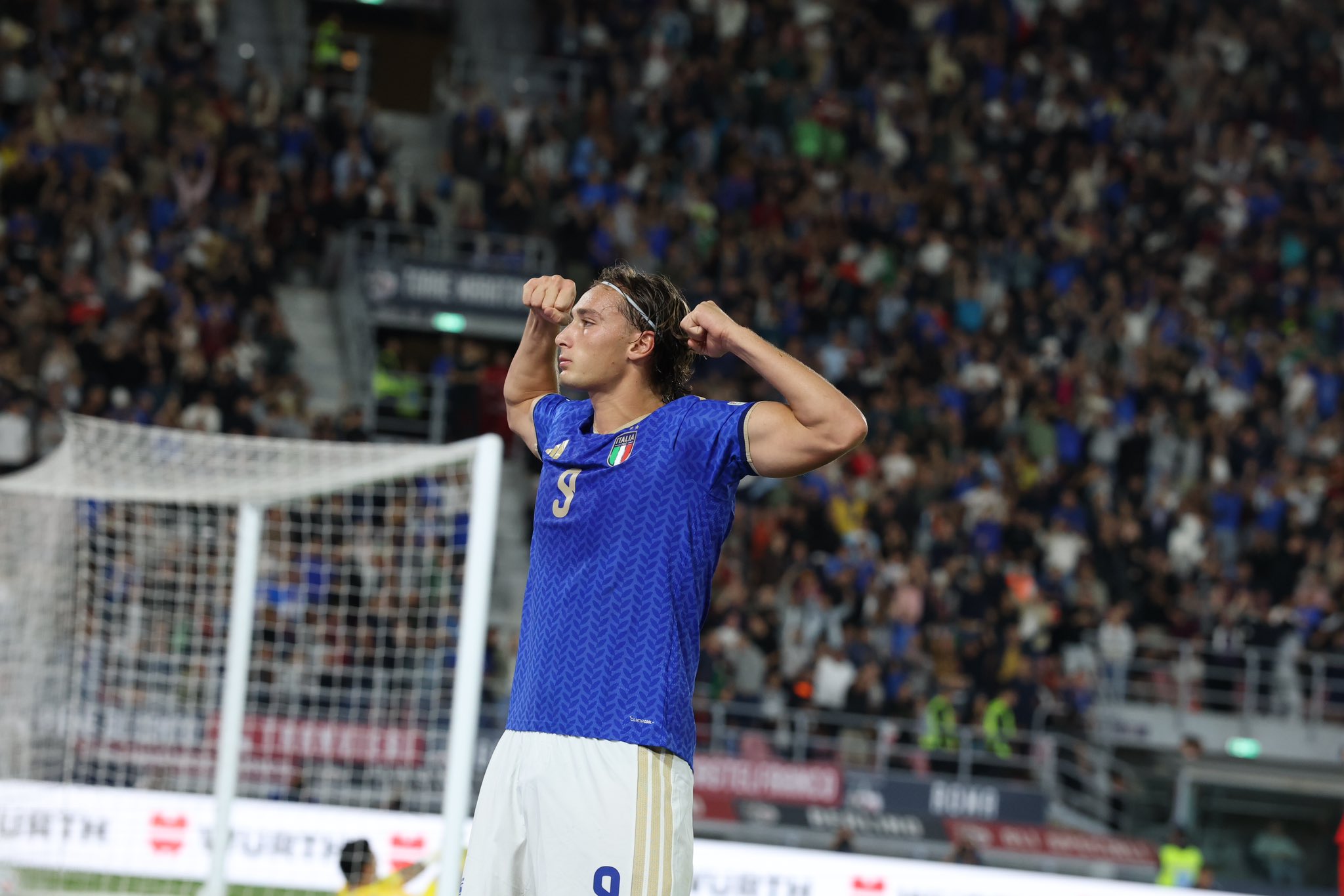 Pio Esposito celebrating goal for Italy