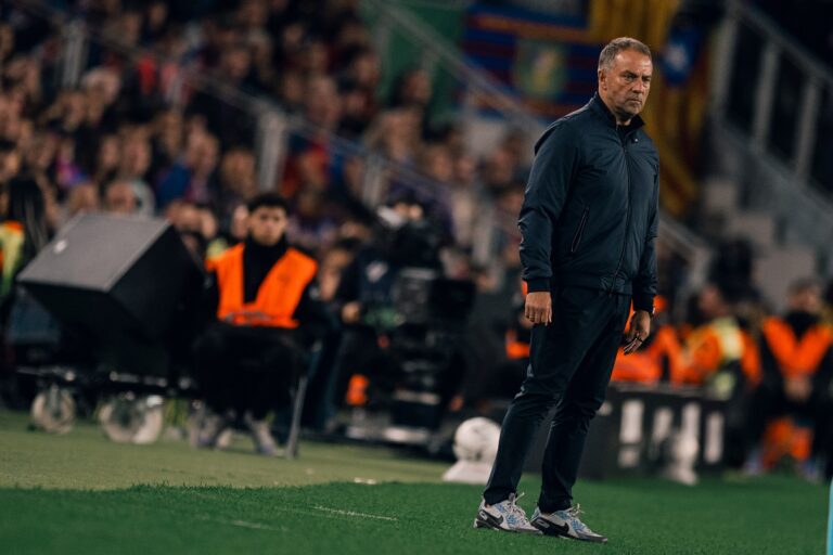 Barcelona manager Hansi Flick watching his team from the sidelines