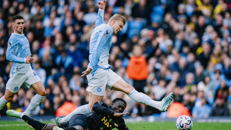 Erling Haaland scoring for Manchester City