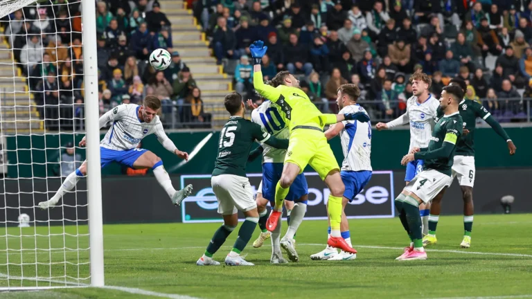 Brighton's Joao Costinha heading the ball