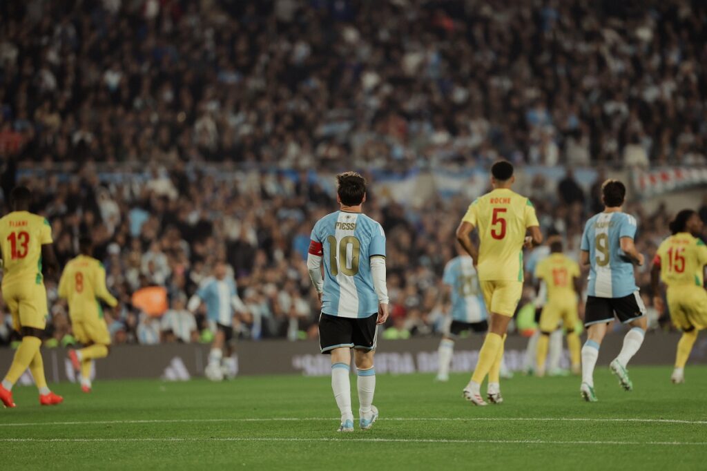 Lionel Messi walking on the pitch in his final game for Argentina