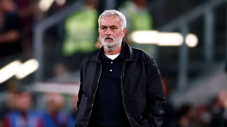 Real Madrid coach Jose Mourinho standing on the sidelines
