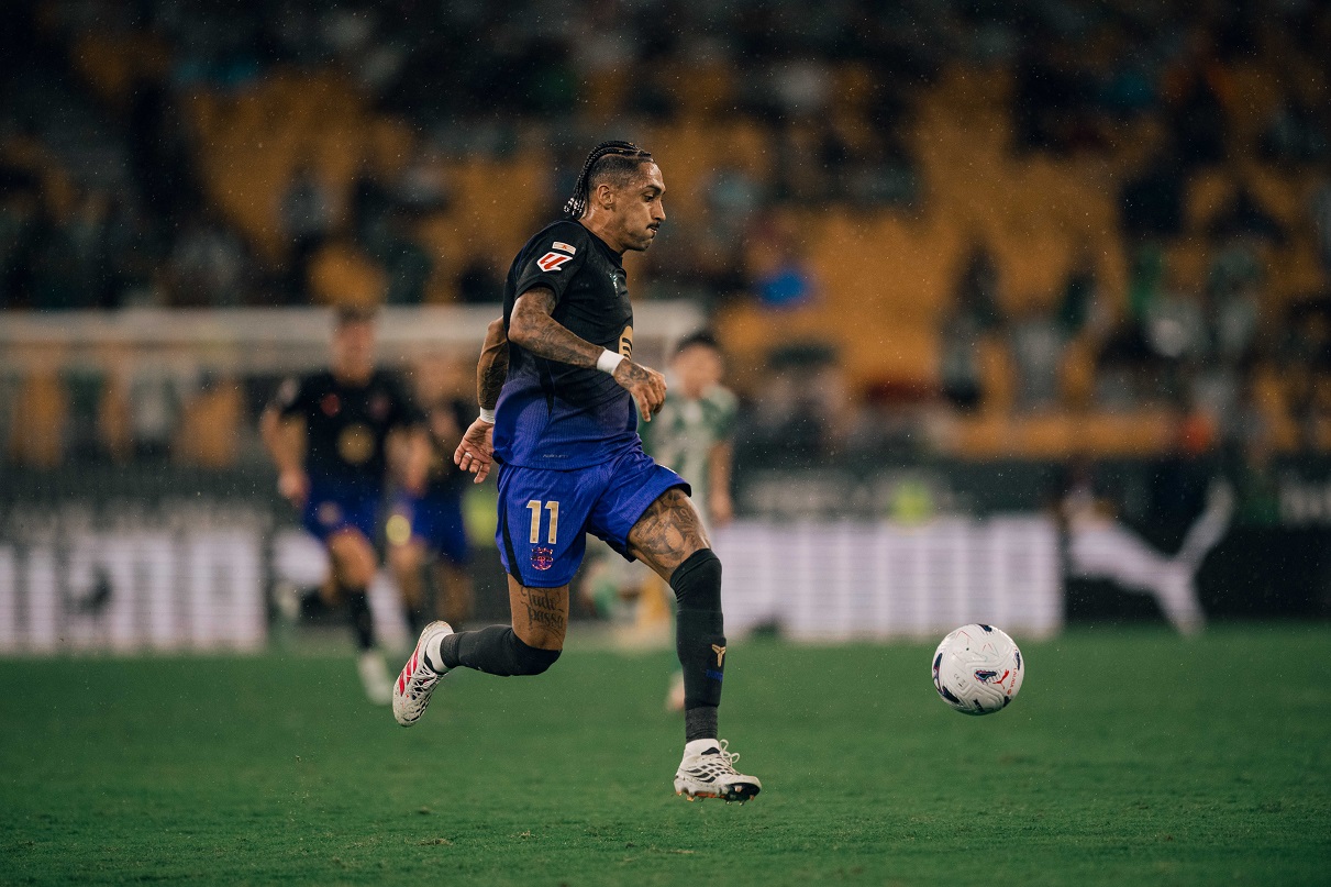 Barcelona's Raphinha running with the ball