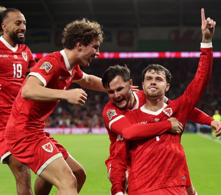 Wales players celebrating a goal